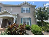 Charming home featuring a well-maintained yard and inviting entrance at 1177 Triece Ln, Charlotte, NC 28215