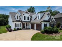 Charming two-story home with a landscaped yard, attached garage, and inviting curb appeal at 3622 46Th Ne Ave, Hickory, NC 28601