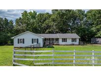 Charming one-story home featuring a well-maintained lawn and traditional design at 4395 Burton Rd, Maiden, NC 28650