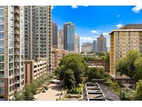 A view of a skyline of Charlotte from atop a building on a clear day with blue sky at 715 N Church St # 513, Charlotte, NC 28202