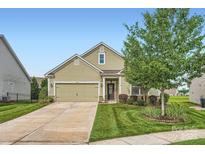 Charming single-Gathering home with a well-maintained lawn and a two-car garage at 125 Rosebay Dr, Mooresville, NC 28117