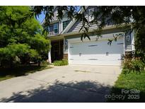 Charming home featuring a large driveway and two-car garage at 4003 Northerly Island Ct, Gastonia, NC 28056