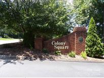 Welcoming brick Colony Square sign surrounded by mature trees and lush landscaping at 833 21St Ne Ave # 833, Hickory, NC 28301
