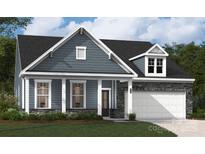 Charming single-Gathering home features stone accents, a covered porch, and a well-maintained lawn at 5119 Raging Creek Dr, Indian Trail, NC 28079