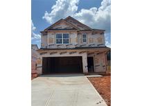 New construction showing covered porch and open garage of this single Gathering home with Dryline weather barrier at 7008 Jerimoth Dr, Charlotte, NC 28215