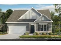 Charming single-Gathering home with gray siding, white trim, an optional metal roof, and a manicured lawn at 1479 Hubert Graham Way, Tega Cay, SC 29708