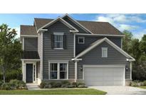 Charming two-story home with gray siding, a two-car garage, and a well-maintained front yard at 1465 Hubert Graham Way, Tega Cay, SC 29708