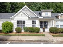 Charming home with white siding, well-manicured landscaping, and a welcoming entrance at 409 Lexie Ln, Rock Hill, SC 29732