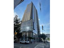 Contemporary, high-rise building with glass facade at 333 W Trade St # 505, Charlotte, NC 28202