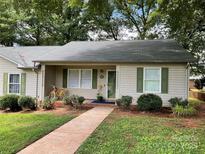Charming single-story home with a cozy front porch and a welcoming walkway at 1124 St. Charles Ct # 3, Newton, NC 28658