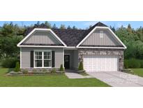 Charming single-Gathering home boasting stone accents, a well-manicured lawn, and an attached two-car garage at 905 Exeter Dr, Sherrills Ford, NC 28673