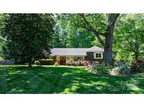 Charming single story home with well maintained lawn and landscaping at 701 5Th Ne Ave, Conover, NC 28613