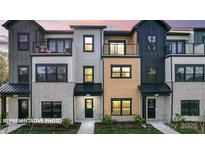 Charming townhome featuring modern design, brick accents, and a cozy balcony in a well-maintained neighborhood at 732 Falling Oak Aly # 22, Huntersville, NC 28078