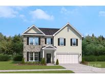 Charming two-story home featuring a stone facade, black shutters, and a well-manicured lawn at 4121 Vista Pine Dr, Charlotte, NC 28215