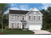 Charming two-story home featuring a classic design, a two-car garage, and well-manicured lawn at 4125 Vista Pine Dr, Charlotte, NC 28215