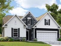 Charming new construction home showcasing a stylish stone and white facade with a two-car garage and manicured lawn at 6346 Fairfax Ct, Maiden, NC 28650