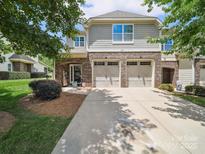 Charming home featuring a brick facade and a convenient two-car garage, perfect for modern living at 9428 Carneros Creek Rd, Charlotte, NC 28214
