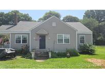Charming single-story home with a well-maintained yard, gray siding, and front door with a covered entrance at 3418 York Hwy, Gastonia, NC 28052