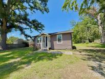 Charming single-story house with a well-maintained lawn and inviting front porch at 419 Lige St, Rock Hill, SC 29730