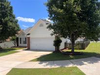 Charming single-Gathering home featuring a two-car garage and well-maintained lawn at 4697 Madeline Dr, Rock Hill, SC 29732