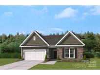 Charming single-Gathering home boasting stone accents, gray siding, and an attached two-car garage at 900 Exeter Dr, Sherrills Ford, NC 28673