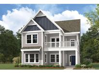 Charming two-story home showcasing a covered porch, neutral siding, and complementary architectural details at 4037 Grommet Ct, Matthews, NC 28105