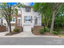 Charming townhome featuring a one car garage, and covered front porch at 9639 Green Gable Ct, Charlotte, NC 28270
