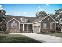 Charming single-story home featuring stone accents, a covered front porch, and an attached two-car garage at 2093 Fordhill St, Rock Hill, SC 29732