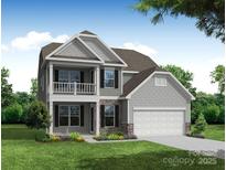 Charming two-story home with stone accents, a second story porch, and well-manicured front lawn at 111 Longwood Rd # 59, Mooresville, NC 28115