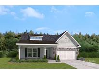 Charming single-story home featuring stone accents, dormer and a well-manicured lawn at 5115 Raging Creek Dr, Indian Trail, NC 28079