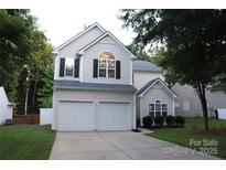 Charming two-story home featuring a two-car garage and well-maintained lawn at 3092 S Legacy Park Blvd, Fort Mill, SC 29707
