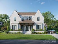 Stunning two-story white brick home with black trim, manicured lawn, and a welcoming front porch at 914 Edinburgh Ln, Charlotte, NC 28209