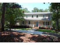 Charming two-story home featuring a welcoming front porch and well-maintained landscaping at 1325 Lee Lynn Dr # 7 Part Of 6, Albemarle, NC 28001