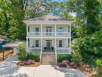 Charming two-story home with a double porch and beautiful landscaping at 319 Catawba Ave, Rock Hill, SC 29730