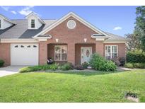 Charming brick home with well-manicured lawn and inviting front porch entrance with nice landscaping at 407 Knops Nob Rd, Mooresville, NC 28115