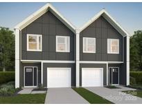 Modern two-story townhomes with clean lines, dark siding, and white trim at 3719 Davis Ave, Charlotte, NC 28208