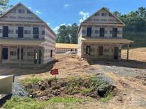 New construction home showcasing the framing and exterior features in a developing community at Tbd S Park Dr, Wadesboro, NC 28170