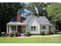 Charming single-story home with a brick chimney and inviting front porch at 1541 Kings Rd, Shelby, NC 28150