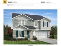 Charming two-story home featuring light gray siding, stone accents, blue shutters, and a two-car garage at 3001 Cunningham Farm Dr, Indian Trail, NC 28079