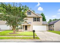 Charming two-story home with well-manicured lawn, integrated garage, and traditional design at 4412 Trillium Fields Dr, Charlotte, NC 28269