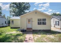 Charming single-story home with a simple design, small porch and a brick walkway at 333 Friendship Dr, Rock Hill, SC 29730