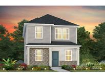 Charming two-story home featuring a gray color palette, covered entry, and manicured landscaping at 14024 Penbury Ln # 330, Charlotte, NC 28278