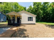 Charming, newly renovated, single-story home with a welcoming front porch and fresh landscaping at 426 Williamson St, Rock Hill, SC 29730