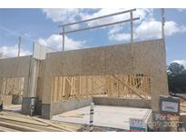 Close up on the exterior of the house under construction showing wood and framing elements at 2946 Clyde Dr # 29, Charlotte, NC 28208