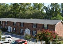 Charming brick townhomes with well-maintained landscaping and parking at 824 6Th Nw St # 5, Hickory, NC 28601