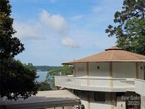 Unique waterfront home with a charming balcony offering stunning lake views at 500 Steel Bridge Loop, Hickory, NC 28601
