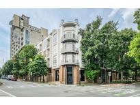 Contemporary condo building featuring balconies and upscale architectural design at 525 E 6Th St, Charlotte, NC 28202