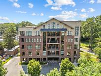 Stunning building with brick exterior, balconies and meticulous architectural details at 2312 Selwyn Ave # 502, Charlotte, NC 28207