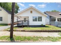 Charming single-Gathering home featuring white siding, a welcoming front porch, and a well-maintained yard at 105 Mcgill Nw Ave, Concord, NC 28025