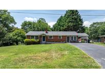 Charming brick home with well-maintained lawn and inviting curb appeal at 2623 Ne 13Th Ne St, Hickory, NC 28601